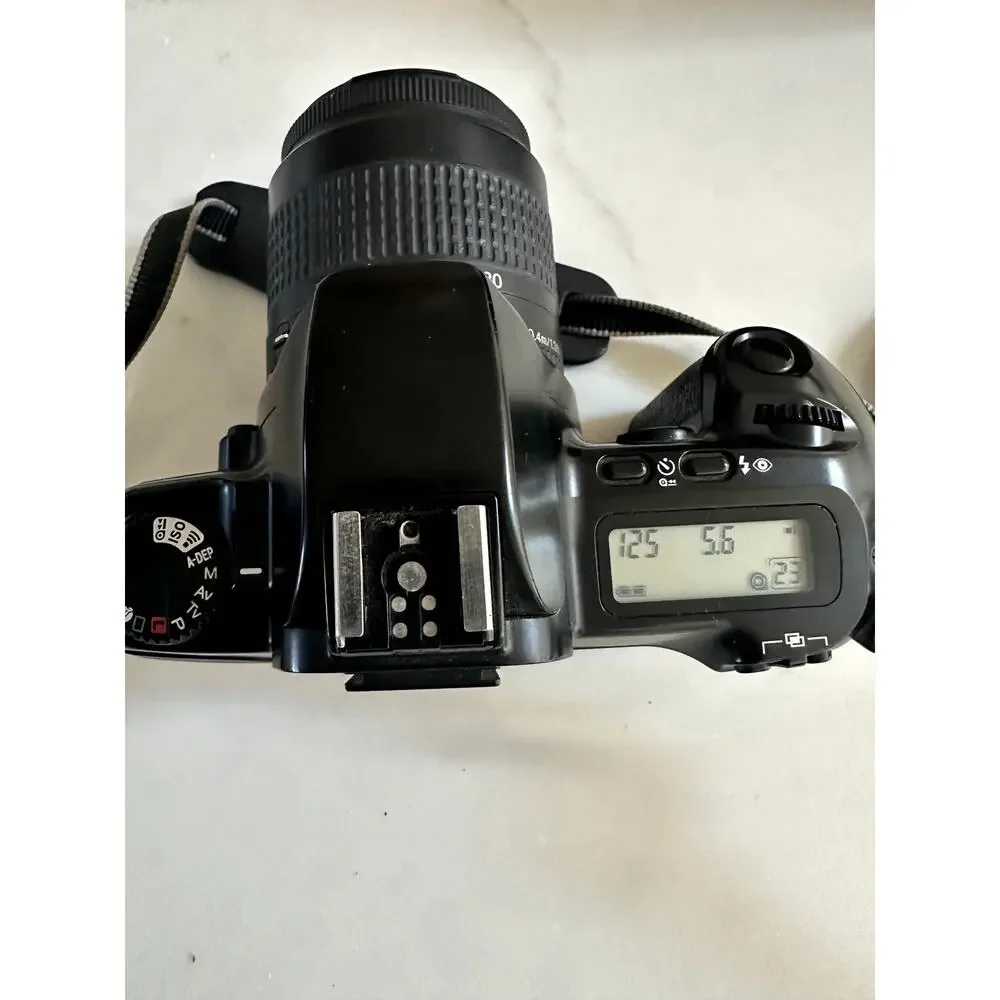 Canon EOS Rebel X S 35mm film camera Canon Zoom Lens EF 35-80mm